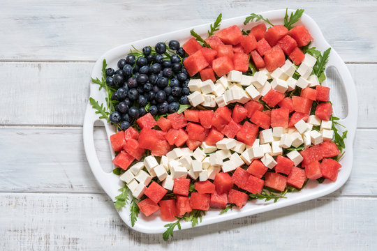 Patriotic American flag salad with blueberry, watermelon and feta