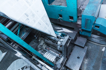 Vinnytsia, Ukraine – december 28, 2017: Press printing machine in poligraphy. Mass printing of newspapers.