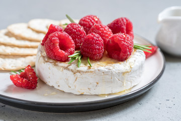 Baked Camembert cheese with raspberry