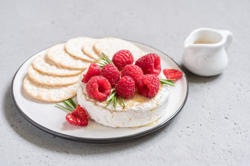Baked Camembert cheese with raspberry
