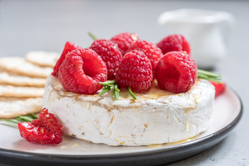 Baked Camembert cheese with raspberry