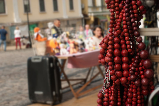 A closeup of ukrainian national jewelry - the red wooden necklace. Concept - necklace is a symbol of woman's beauty, status and weath. The photo was shot at a national fair, Andriyivskyy Descent, Kiev