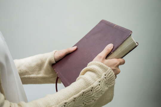 woman holding bible