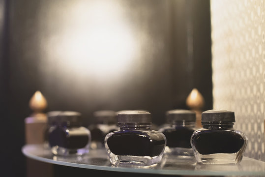 Old glass jars for ink