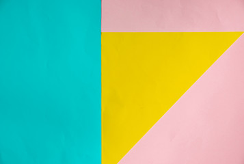 soft Blue, yellow and pink pastel color paper geometric flat lay background
