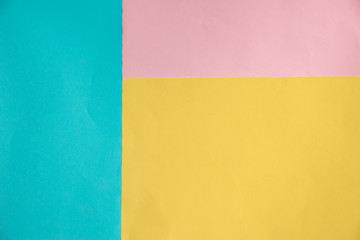soft Blue, yellow and pink pastel color paper geometric flat lay background