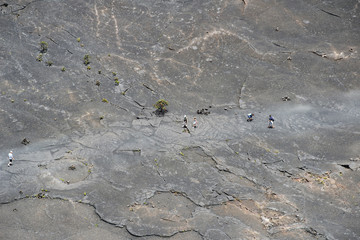 Tourists walking on the Kilauea Iki crater floor, Big Island, Hawaii