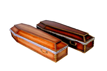 Two closed wooden coffins isolated