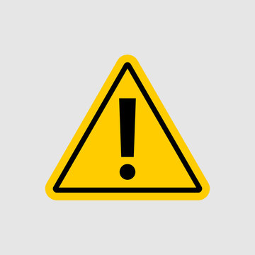 warning - vector icon. warning yellow sign on gray background