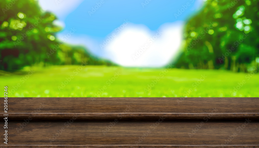 Poster Empty step wood table top with blur tree in park with bokeh light at background,Mock up template for display of your design,Banner for advertise of product,panorama view