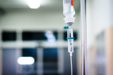 Intravenous therapy iv infusion set and bottle on a pole.