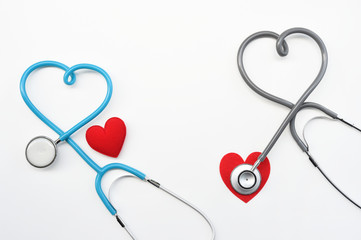 Red heart with stethoscope isolated on white background