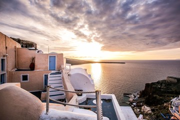 Dramatic and beautiful sunset over Oia, Santorini, Greece