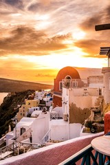 Dramatic and beautiful sunset over Oia, Santorini, Greece - obrazy, fototapety, plakaty