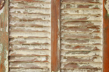 background of old grunge wooden texture with shutters. part of antique old door. For photography product backdrop.