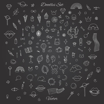 Hand drawn vector set of random doodles with rainbows, lips, planets, skulls, plants and more. Chalk line art on the blackboard background.