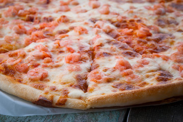Pizza with shrimps closeup