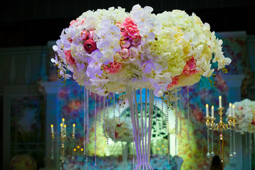 The composition is made by florists from fresh flowers.
