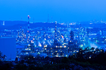 Aerial view Oil refinery.Industrial view at oil refinery plant form industry zone with sunrise and cloudy sky. and Petrochemical background sunset.