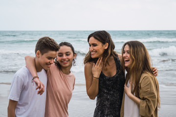 Group of teenagers chattering together in summer
