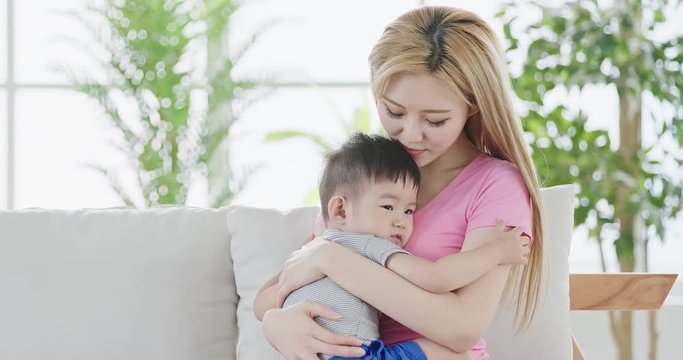 mommy hug her son