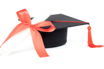 Graduation cap and certificate with red tassel isolated on white background