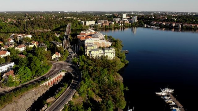 Aerial footage of the Stockholm island Stora Essingen and its tramway track "Tvärbanan"