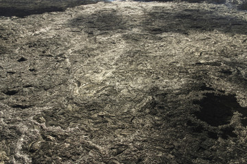Aerial helicopter view of lava field near Kilauea volcano, Big Island, Hawaii