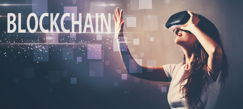 Blockchain with young woman using a virtual reality headset