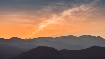 Landscape of forest mountains on sunset