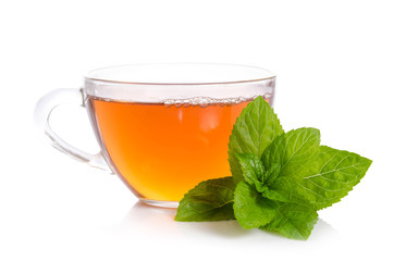Glass cup of Tea with mint leaves isolated on white background