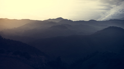 Landscape of forest mountains on sunset