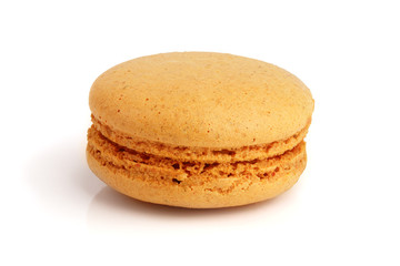 orange macaroon isolated on white background closeup