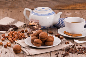 Hazelnut shortbread sandwiches filled with chocolate cream. 