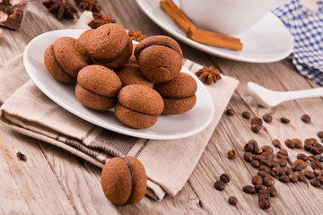 Hazelnut shortbread sandwiches filled with chocolate cream. 