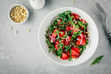 Watermelon with feta, arugula, onion, pine nuts and balsamic sauce.