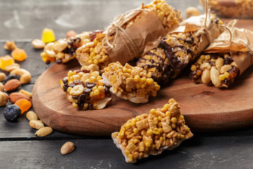 Granola bar on wooden background