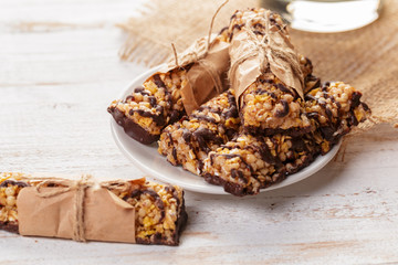 Granola bar on wooden background