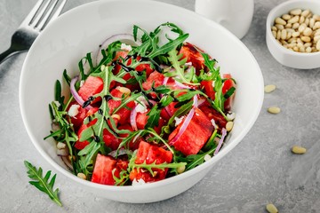 Watermelon with feta, arugula, onion, pine nuts and balsamic sauce.