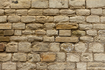 Close-up old white sand stone wall
