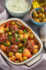 Kofte , beef meatballs, baked with vegetables.