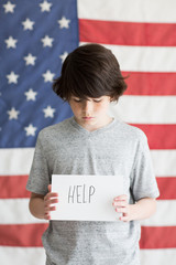 Boy with American flag background