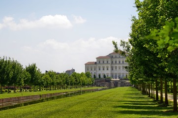 Venaria reale, Piedmont region, Italy. June 2017. The landscape of the gardens of the royal palace of Venaria. Vision from the ruins of the temple of Diana towards the palace. Tourists.