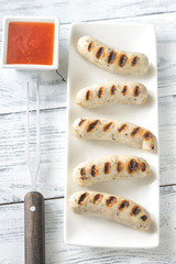 Grilled sausages with sweet chili sauce