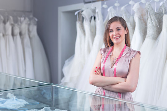 Smiling Seller In A Wedding Shop