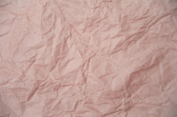 Light pink crumpled paper texture for background