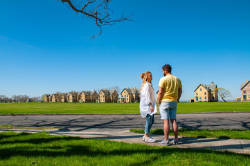 Fototapeta premium Couple of tourists sightseeing at Gateway National Recreation Area
