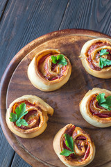 Pizza rolls on the wooden board