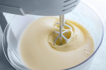  mix biscuit dough with a electric mixer - Powered by Adobe