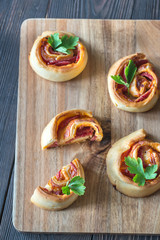 Pizza rolls on the wooden board